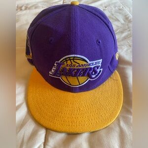 Lakers baseball cap.